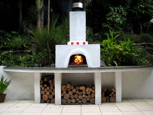 Wood-fired pizza oven, polished concrete bench-top